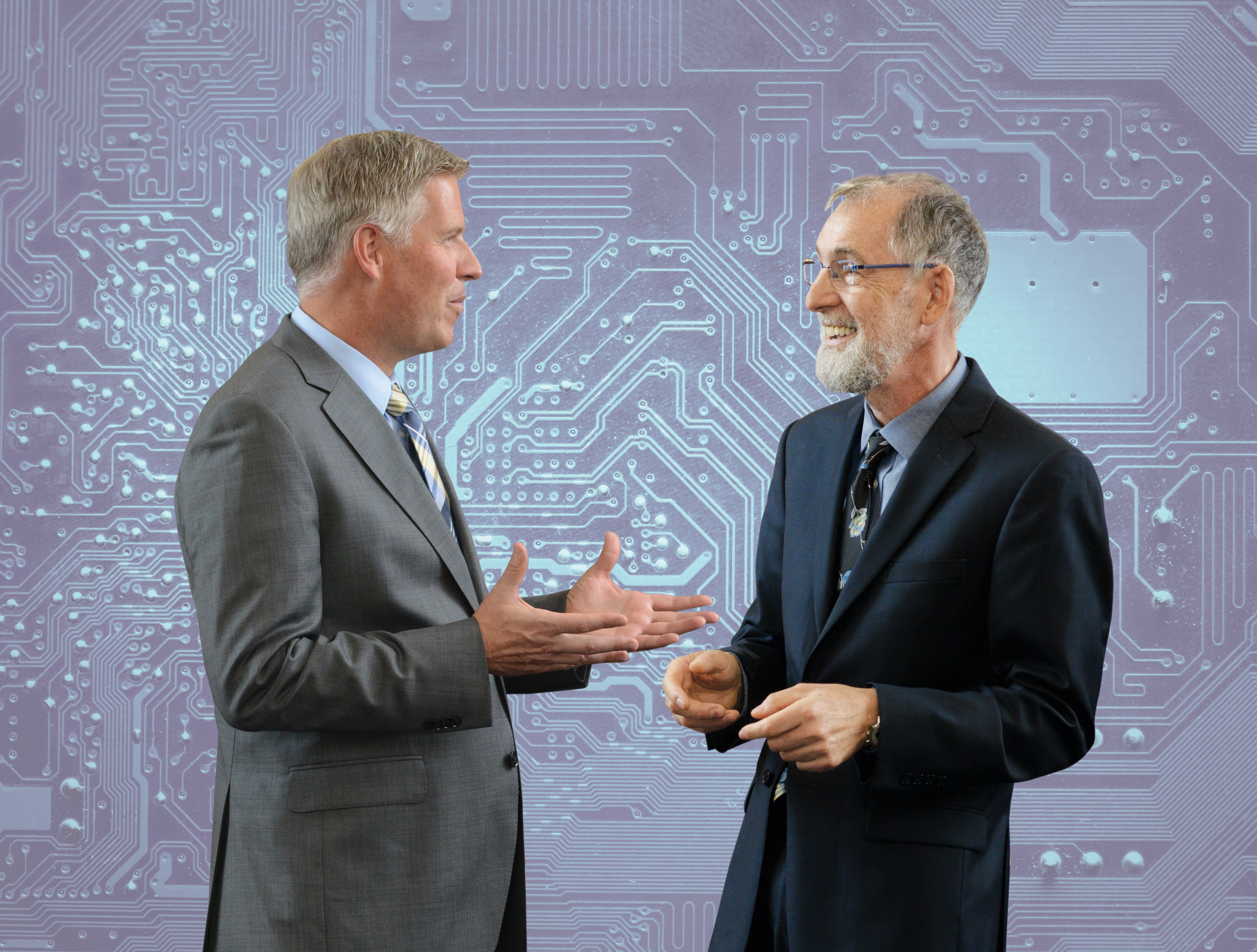 Chancellor Patrick Gallagher talks with Dean Paul Cohen.