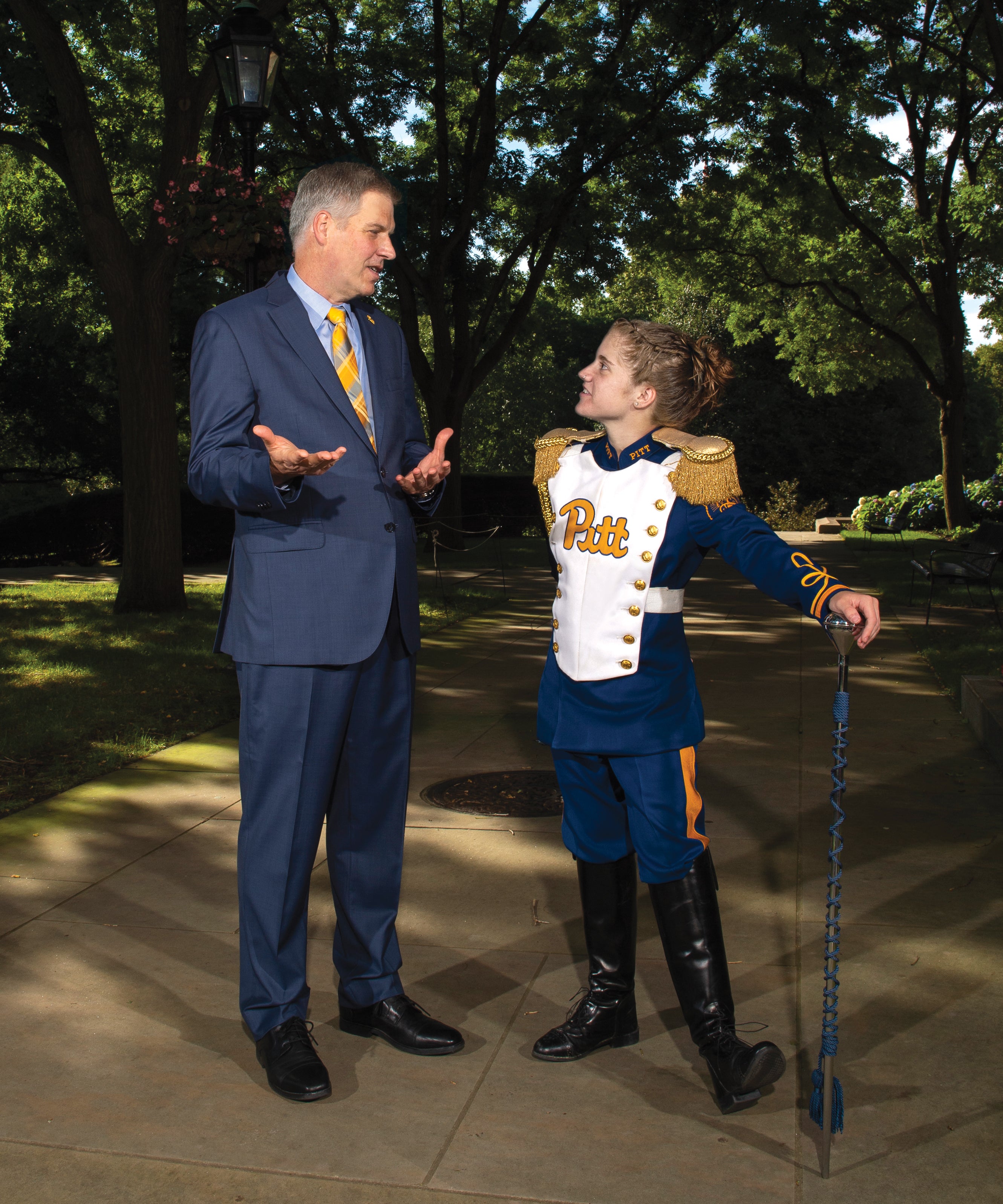 Chancellor Patrick Gallagher and Crissy Shannon talk Pitt Band on the Cathedral lawn