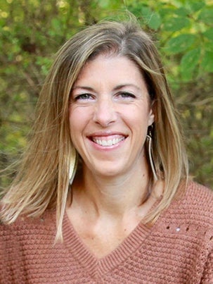 portrait with greenery in background