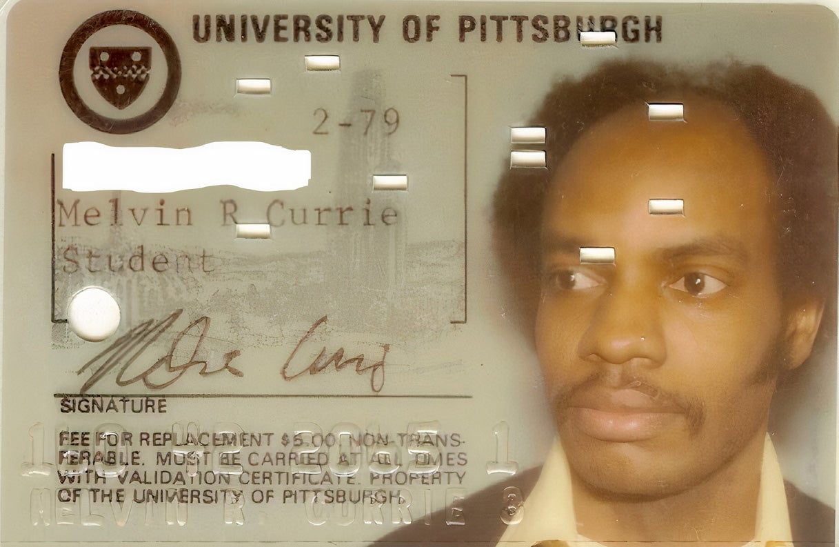 Glossy photo school ID from 1979 for Melvin R Currie, student, with his signature