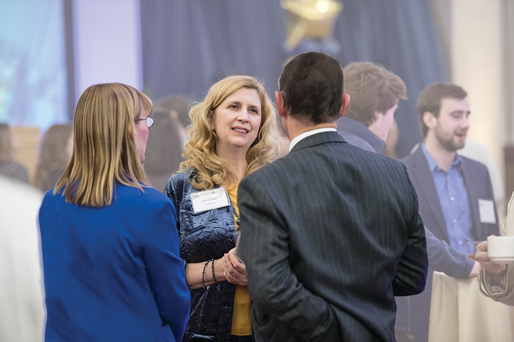 Lisa Polar talks in conversation at the Panthers Forward kick-off reception.