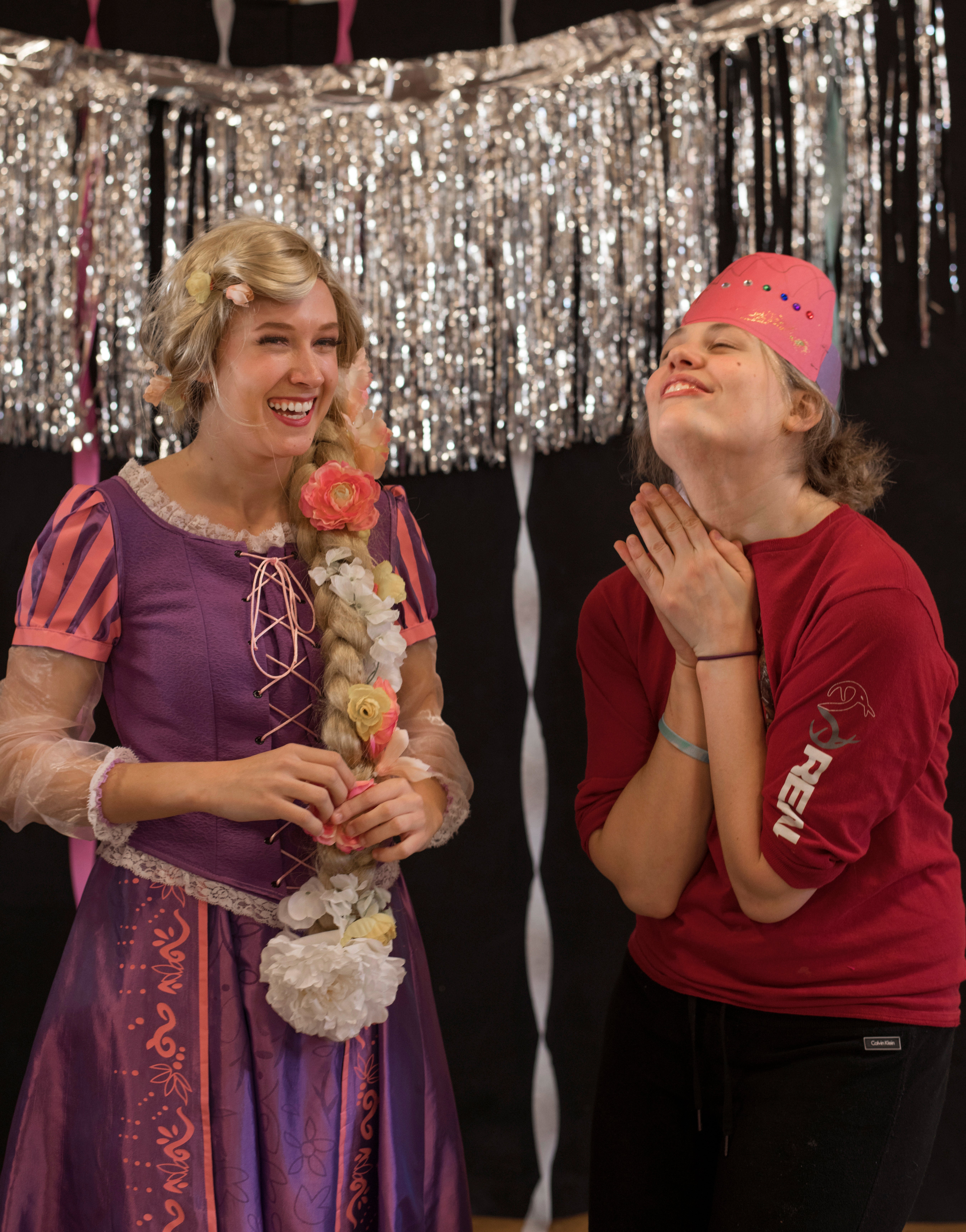 Ronnie (right), Woodlands camper, is thrilled to meet a princess portrayed by Daniela Krahe.