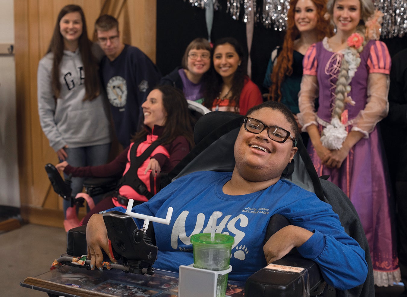 Woodlands camper Amary is all smiles after a bracelet making activity.