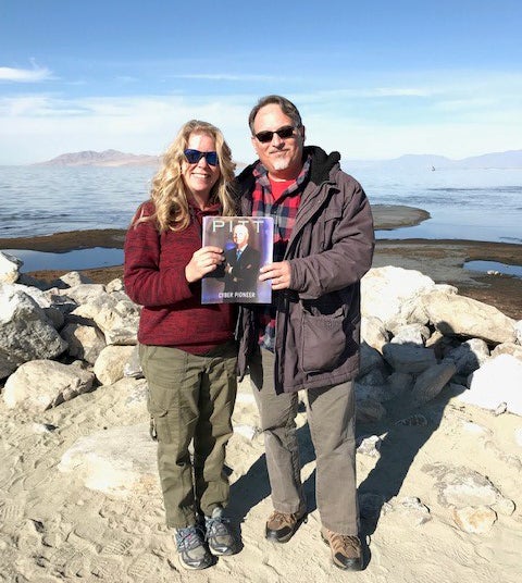 Sunny day on the shore of the Great Salt Lake with the Fall 2019 issue of Pitt Magazine (featuring David Hickton)