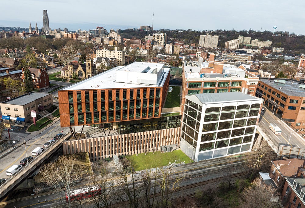 A building and surrounding neighborhood from above