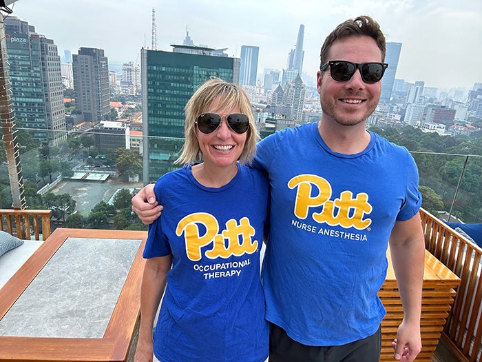 White and Williamson in blue Pitt shirts