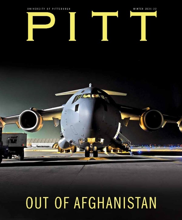 Pitt Magazine Winter 2021-22 cover, Out of Afghanistan, front of airplane on tarmac at night