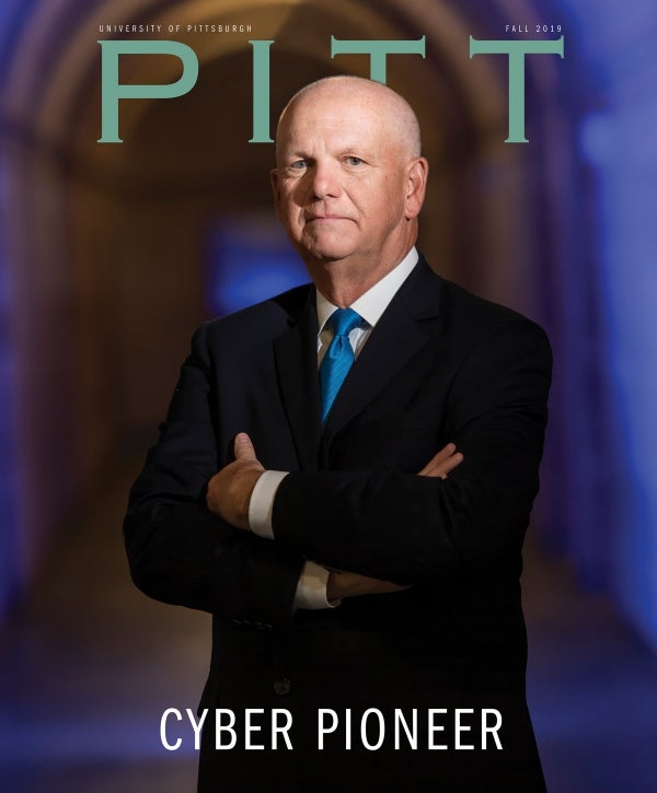 Pitt Magazine Fall 2019 cover, Cyber Pioneer (portrait of David Hickton in the Cathedral of Learning)