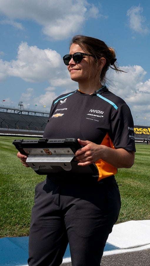 Gundlach stands on the Indianapolis Motor Speedway track