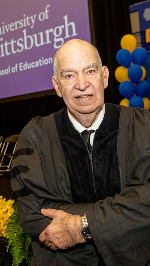 Jose Manduley in graduation robes