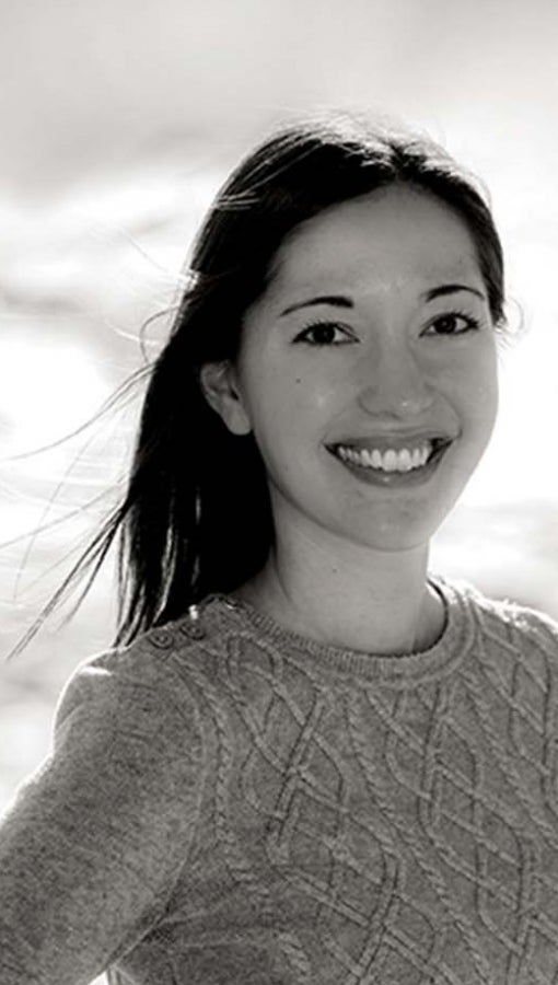 black and white author portrait of woman smiling for camera