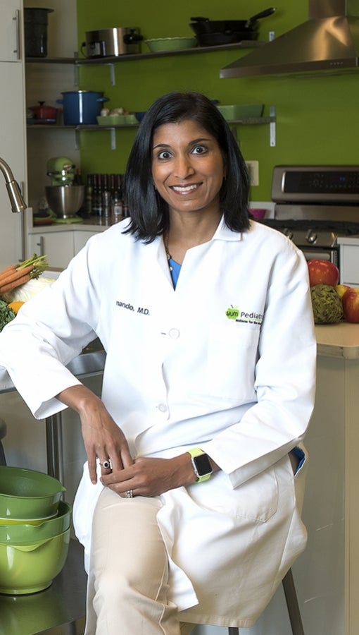 Nimali Fernando, aka Dr. Yum, sits in her office kitchen.