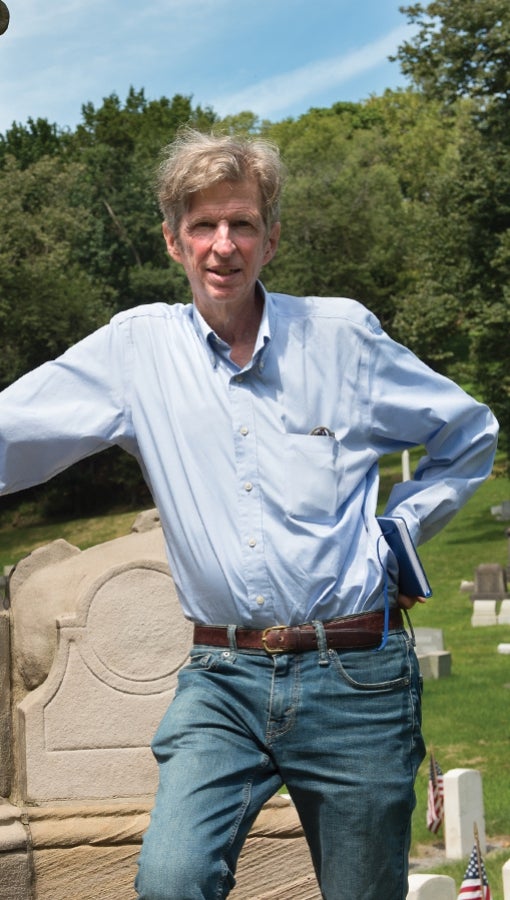 Kirk Savage stands in Allegheny cemetery, where he has previously conducted research on representations of race in monuments.