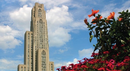 Cathedral of Learning and bright pink and orange flowers