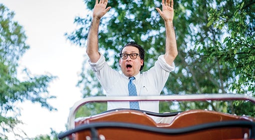 Martin Lewison rides a rollercoaster at Adventureland on Long Island.