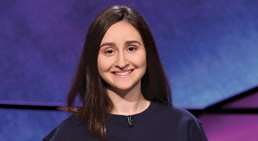 Sarah Dubnik in a Pitt script sweatshirt on the set of Jeopardy!