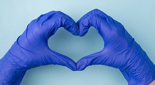 Gloved-hand forming heart
