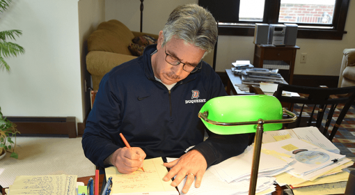 Ken Gormley works on edits to his novel "The Heiress of Pittsburgh" at his home office.