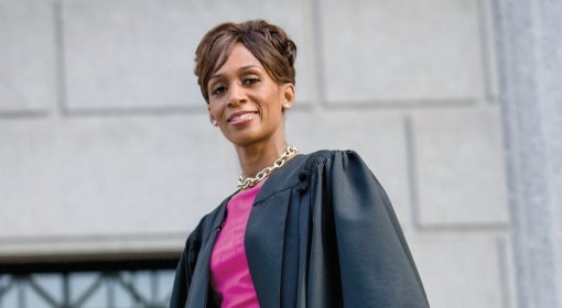 Judge Simpson in her black judicial robes.
