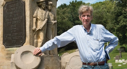 Kirk Savage next to a memorial in Allegheny Cemetery