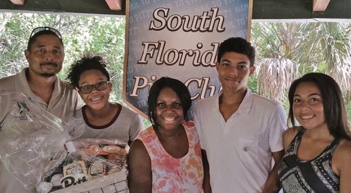 The Addison Family poses for a photo at the South Florida Pitt Club's freshman Send-Off event.