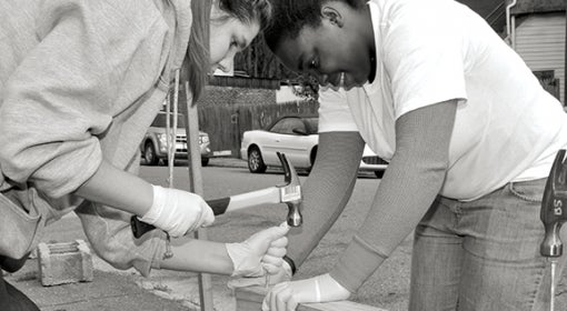 Volunteers work on community project