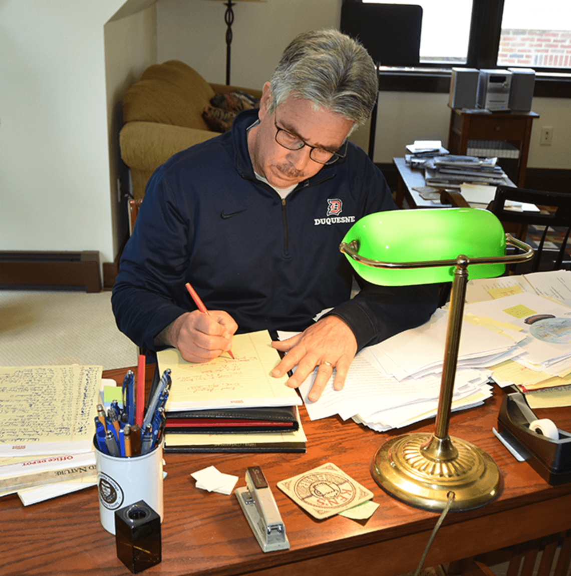 Ken Gormley works on edits to his novel "The Heiress of Pittsburgh" at his home office.