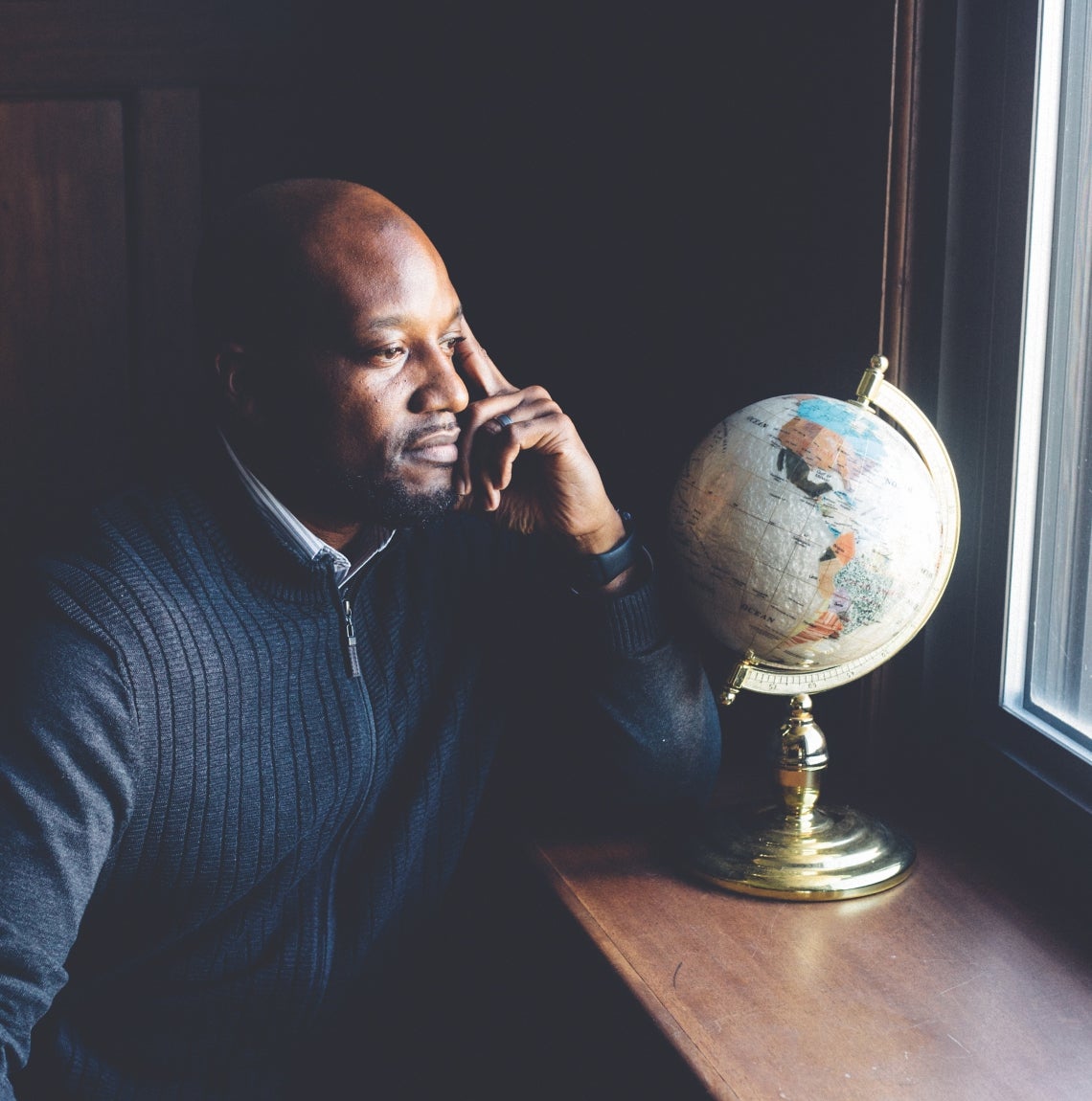 Kenyon Bonner and a globe